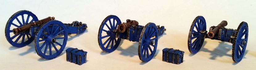 Two cannon and a howitzer.